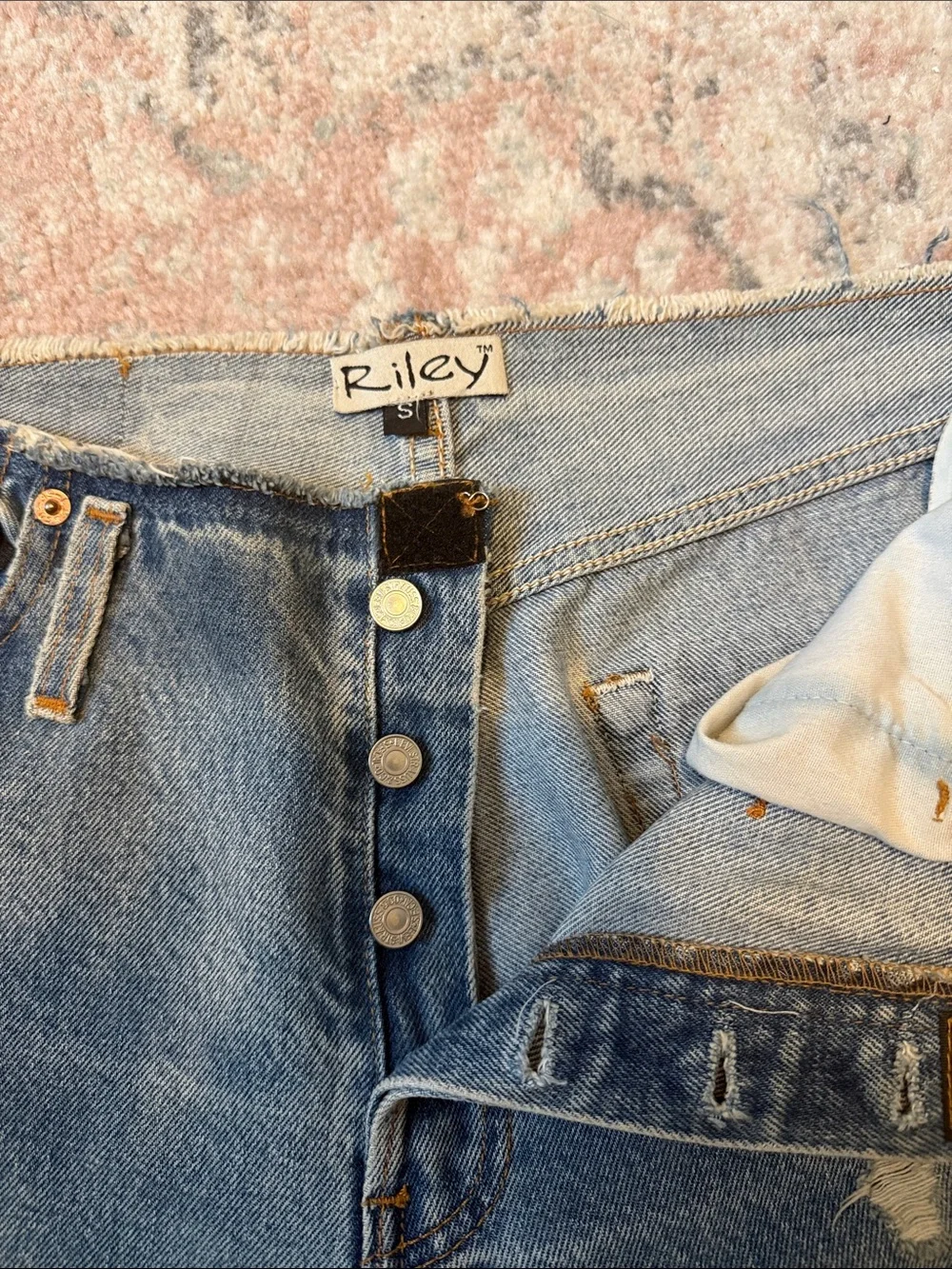 Levi's Distressed Blue Cropped Jeans with Paint Accents